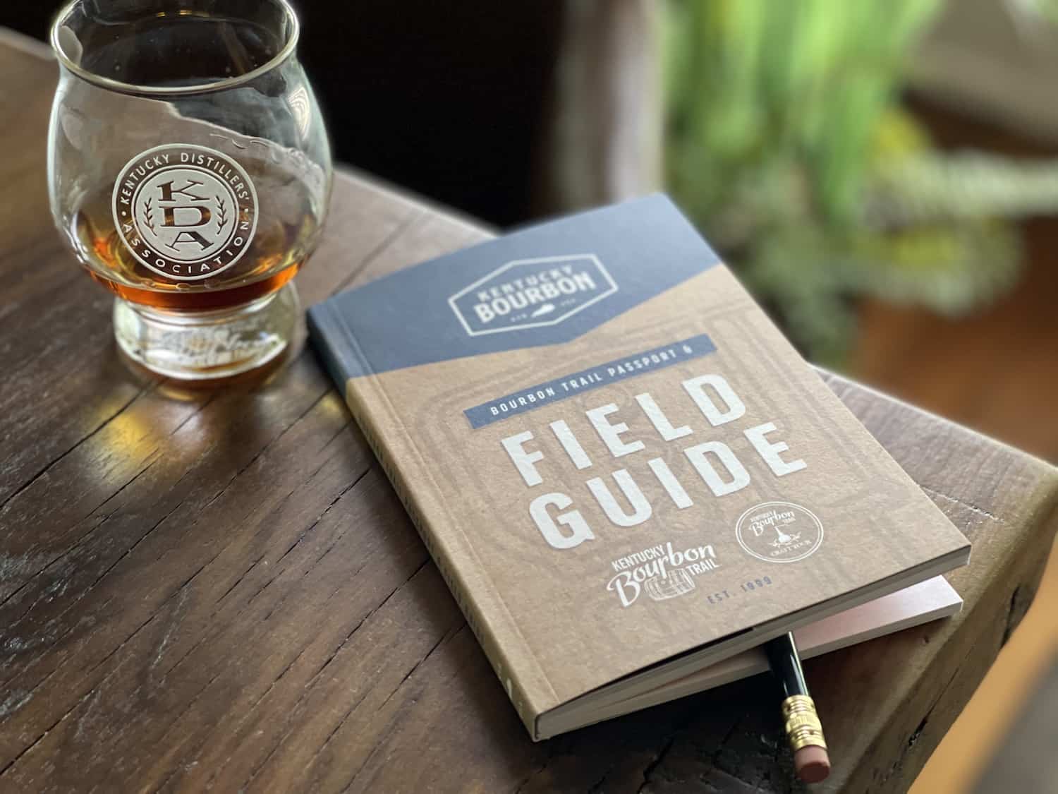 Bourbon Trail passport and Field Guide book on a table