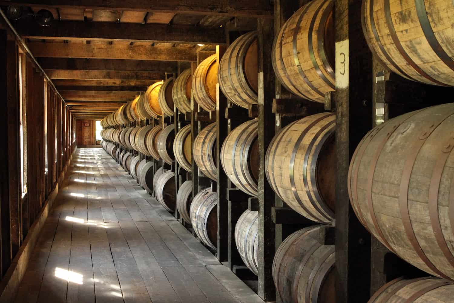 Barrels aging in a rickhouse