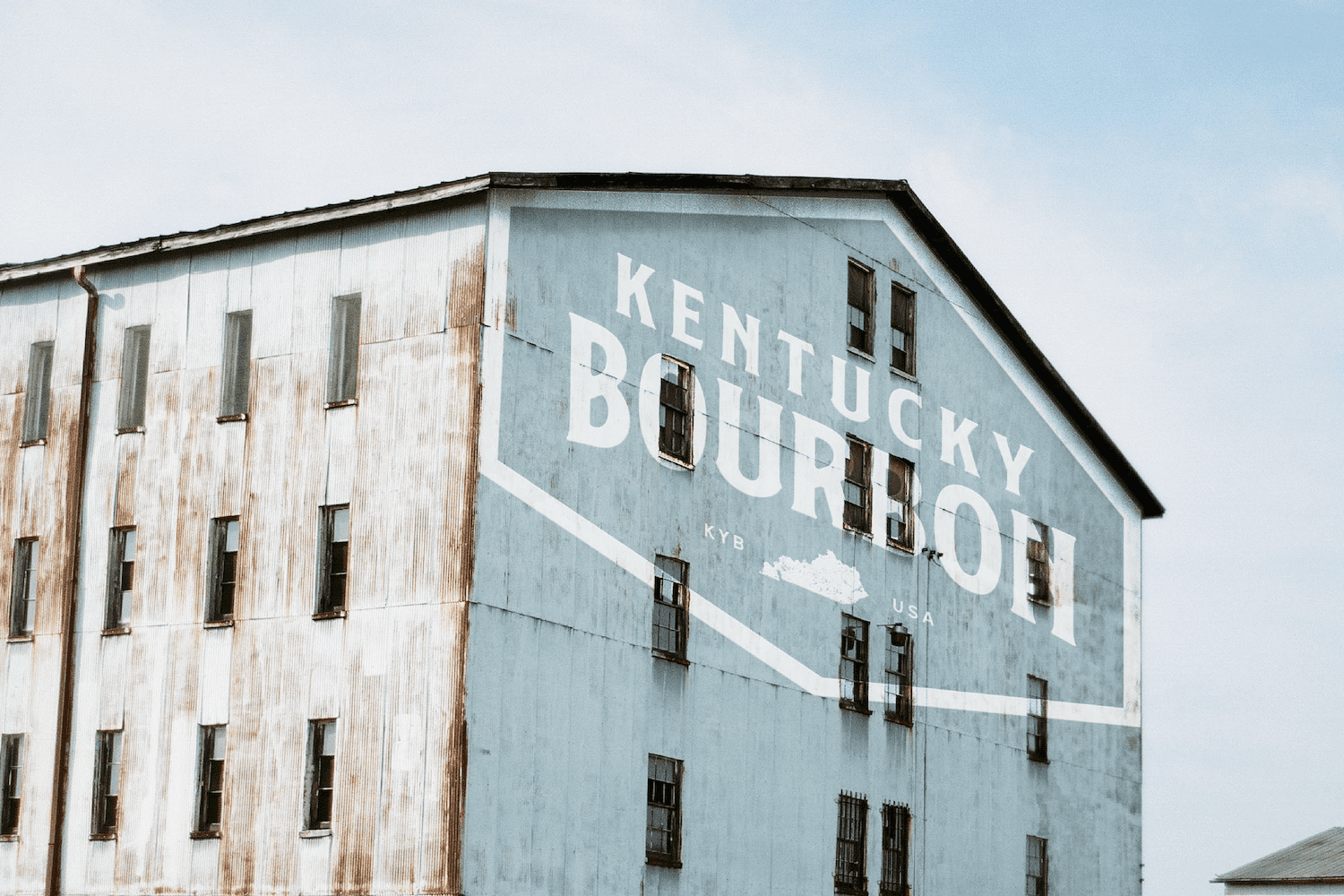 The Kentucky Bourbon logo on the side of a rickhouse